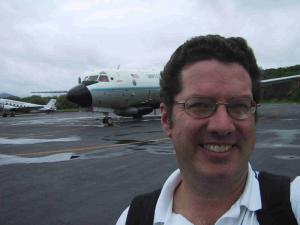 John Bates with NOAA P3 in the backround.